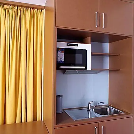 汽车旅馆 橙色翅膀维也纳新城酒店